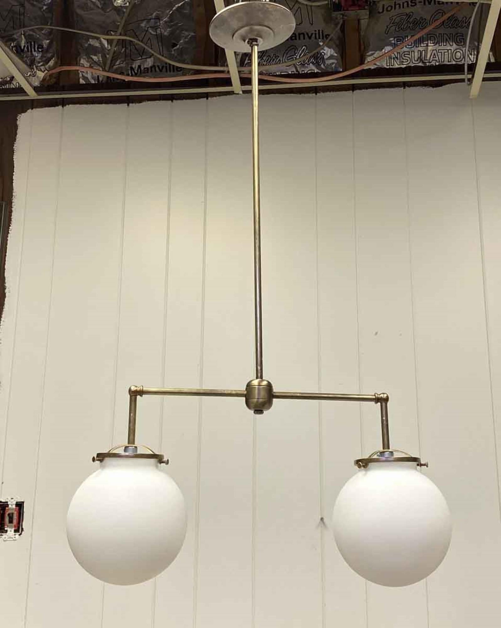 Antique two 6 inch opaline glass globes paired with newly made brass fitter. The height of pole can be adjusted upon request. Please note, this item is located in our Scranton, PA location.