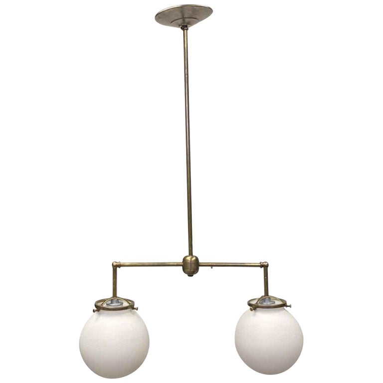 1930s Double Arm Milk Opaline Glass Pendant Globe Fixture with Brass hardware For Sale