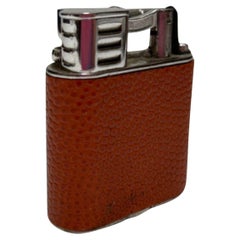 Used 1930s Dunhill Globetrotter Leather Wrapped Sports Lift Arm Lighter