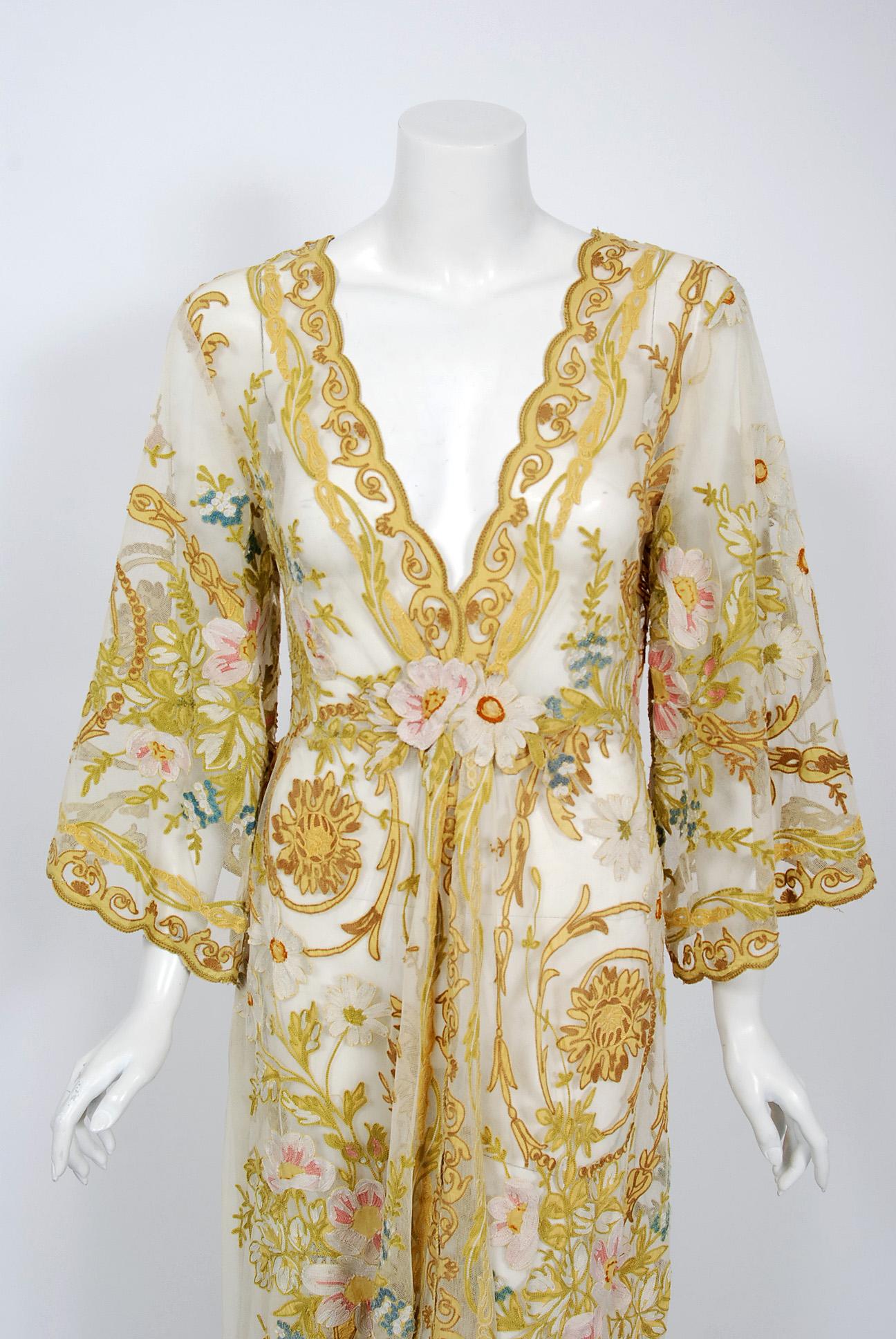 With its gorgeous embroidered floral motif and breathtaking silhouette, this rare 1930's boudior lounge gown makes a memorable impression. It has the most flattering cut with wide 3/4-length sleeves and low-cut plunge. I particularly love the
