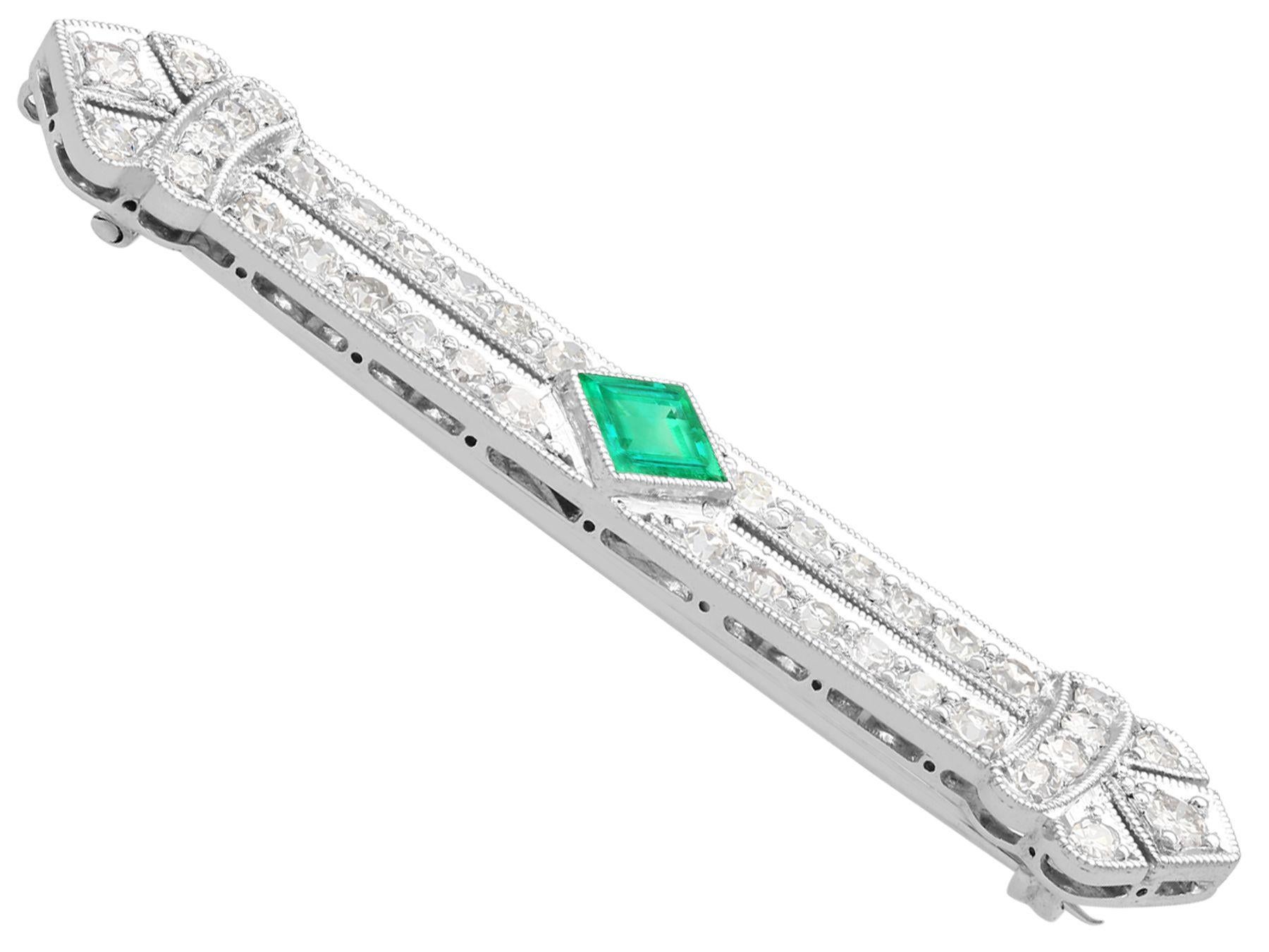Emerald Cut Antique Art Deco Emerald and 1.29 Carat Diamond Platinum Brooch For Sale