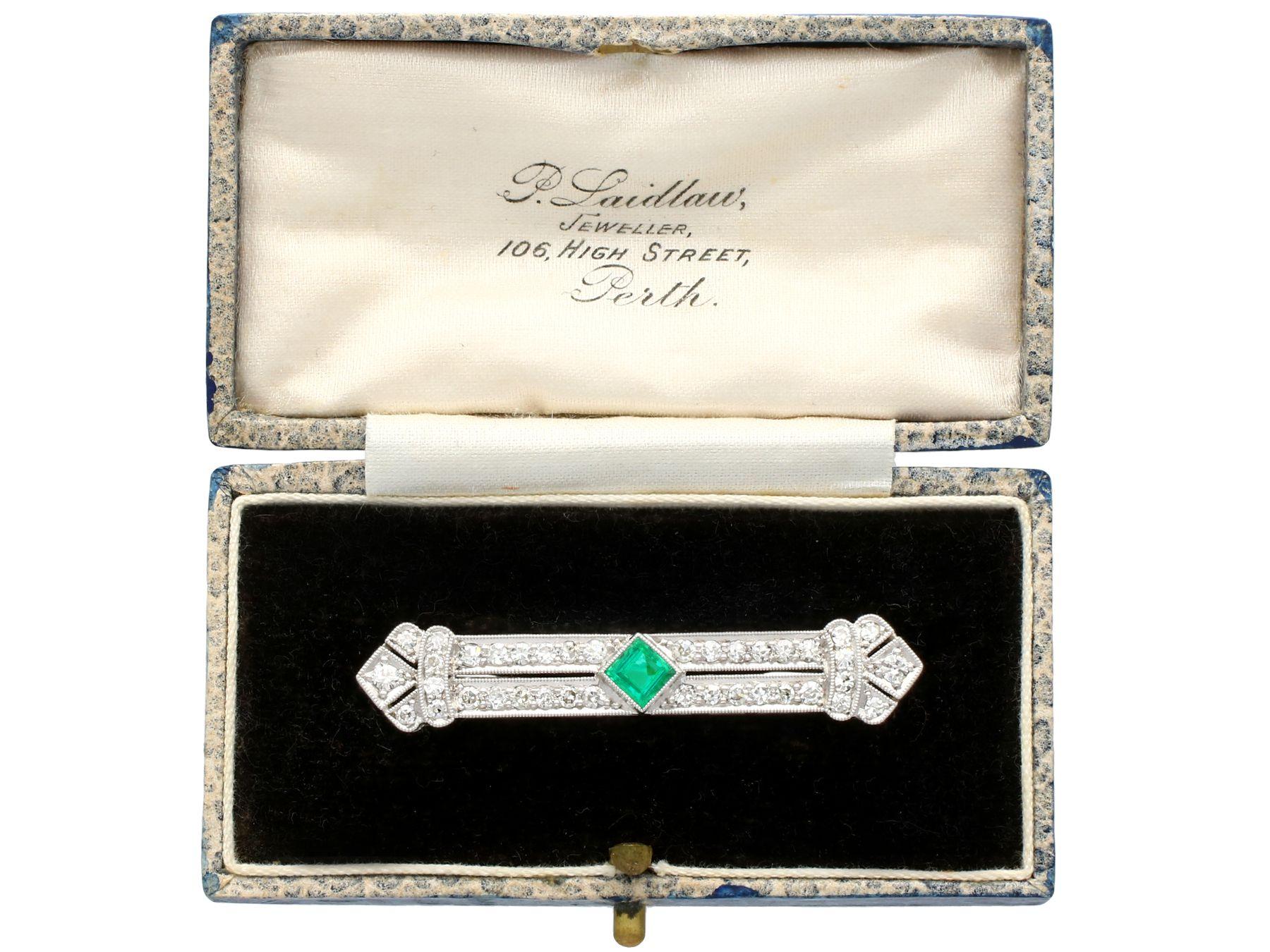 Antique Art Deco Emerald and 1.29 Carat Diamond Platinum Brooch For Sale 3