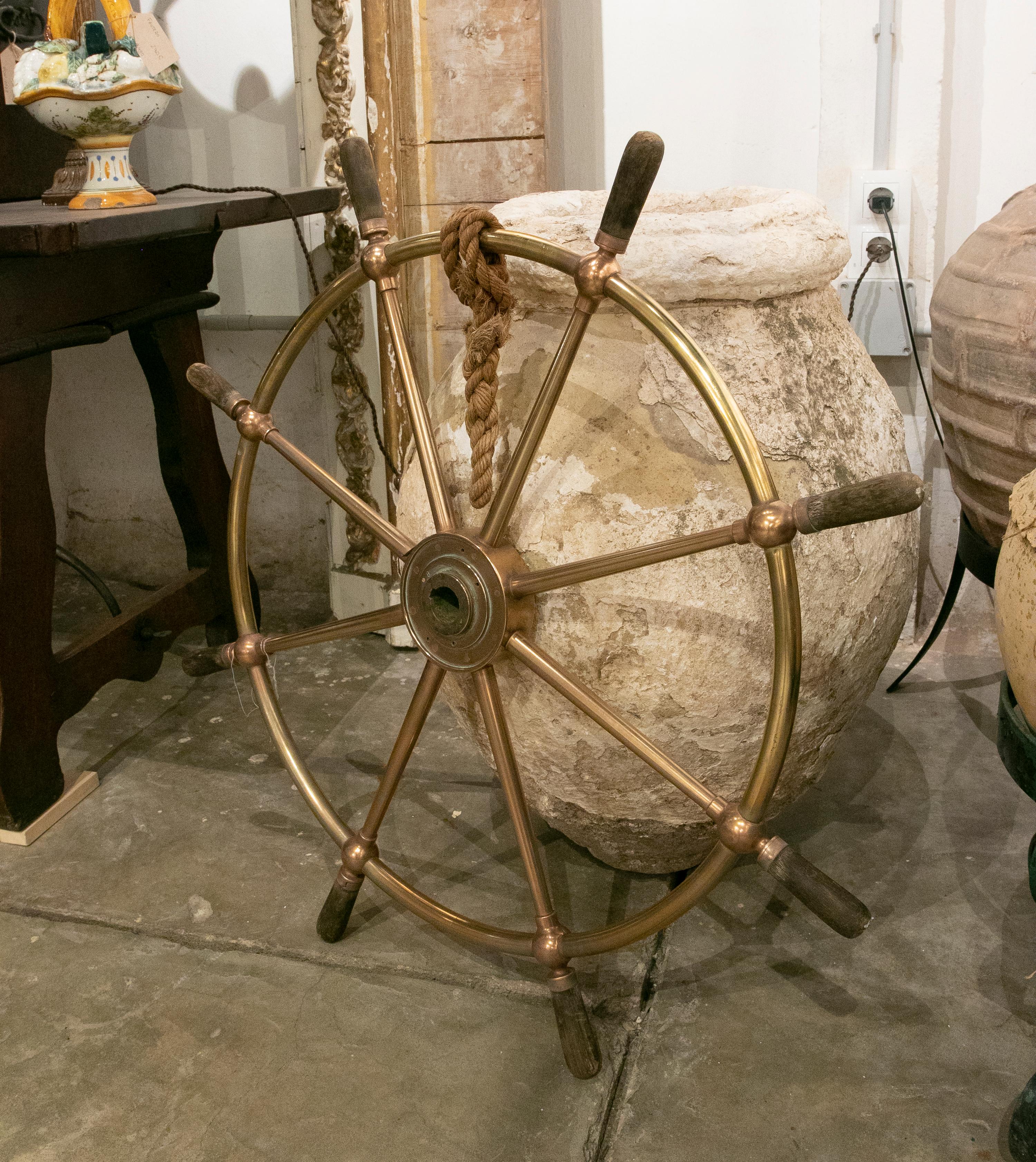 1930's English bronze rudder with wooden handles.