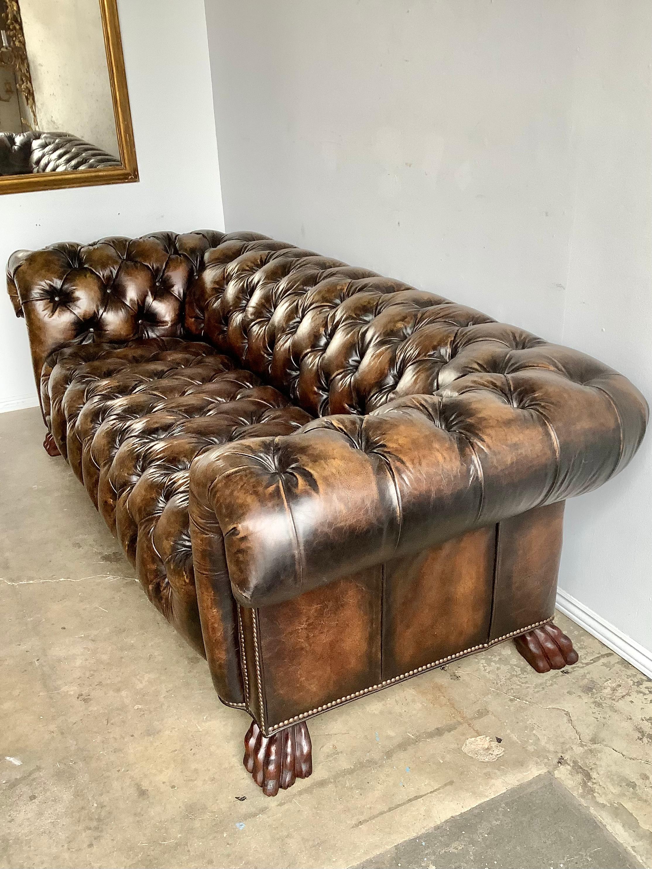 1930’s English Leather Chesterfield Style Sofa with Lion’s Paw Feet In Distressed Condition In Los Angeles, CA