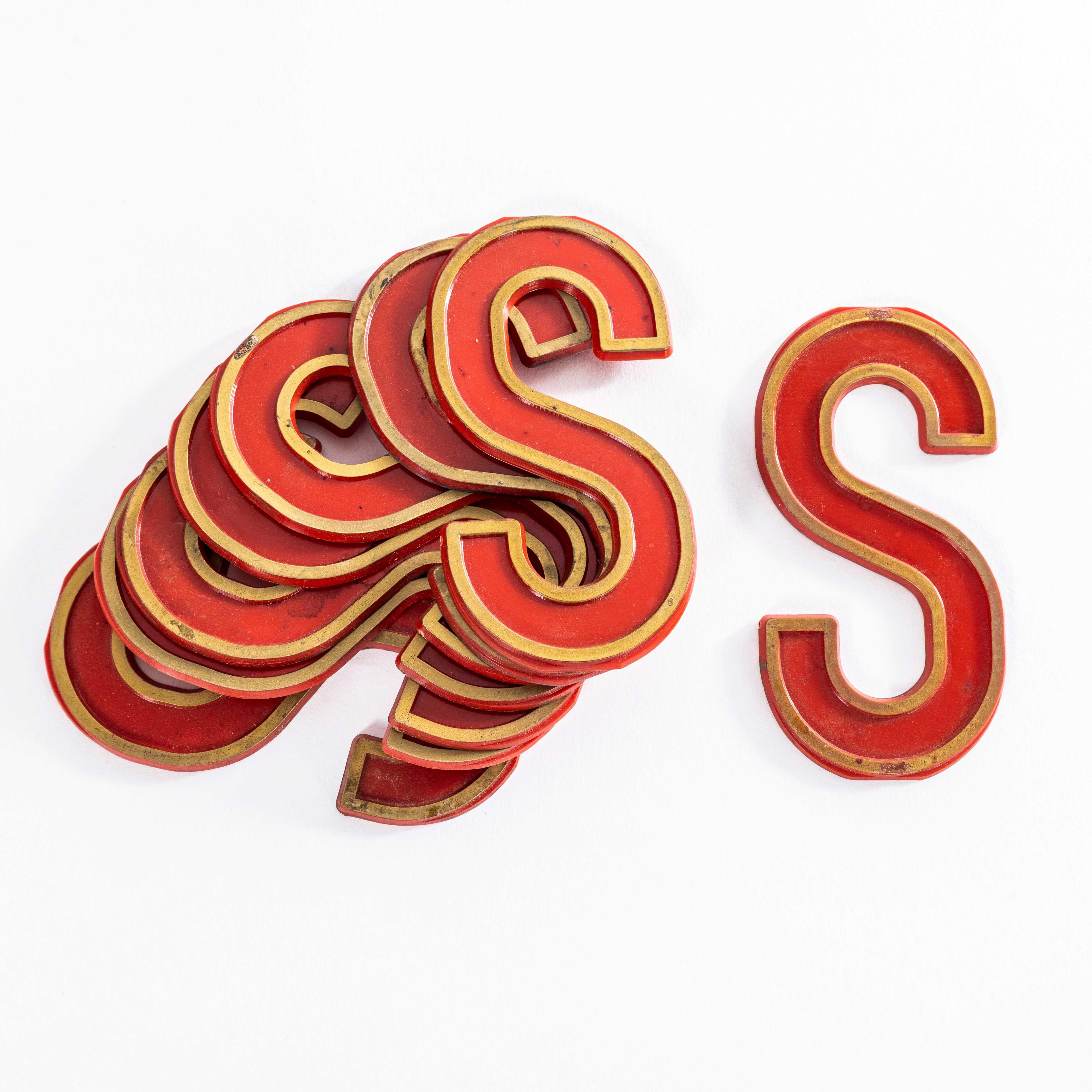 1930’s English Marquee Cinema Letter – S. 
Classic English cinema letters used at cinemas as signage for the film title, actors and so on. Made in acrylic plastic they slotted into tracks on the billboard. The term marquee comes from the French word