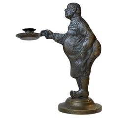 1930s Fat Man Candlestick in Bronze