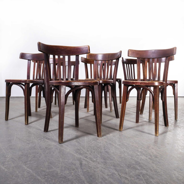 1930’s Fischel French bentwood saddle back dining chairs – set of ten

1930’s Fischel French bentwood saddle back dining chairs – set of ten. The process of steam bending beech to create elegant chairs was discovered and developed by Thonet, but