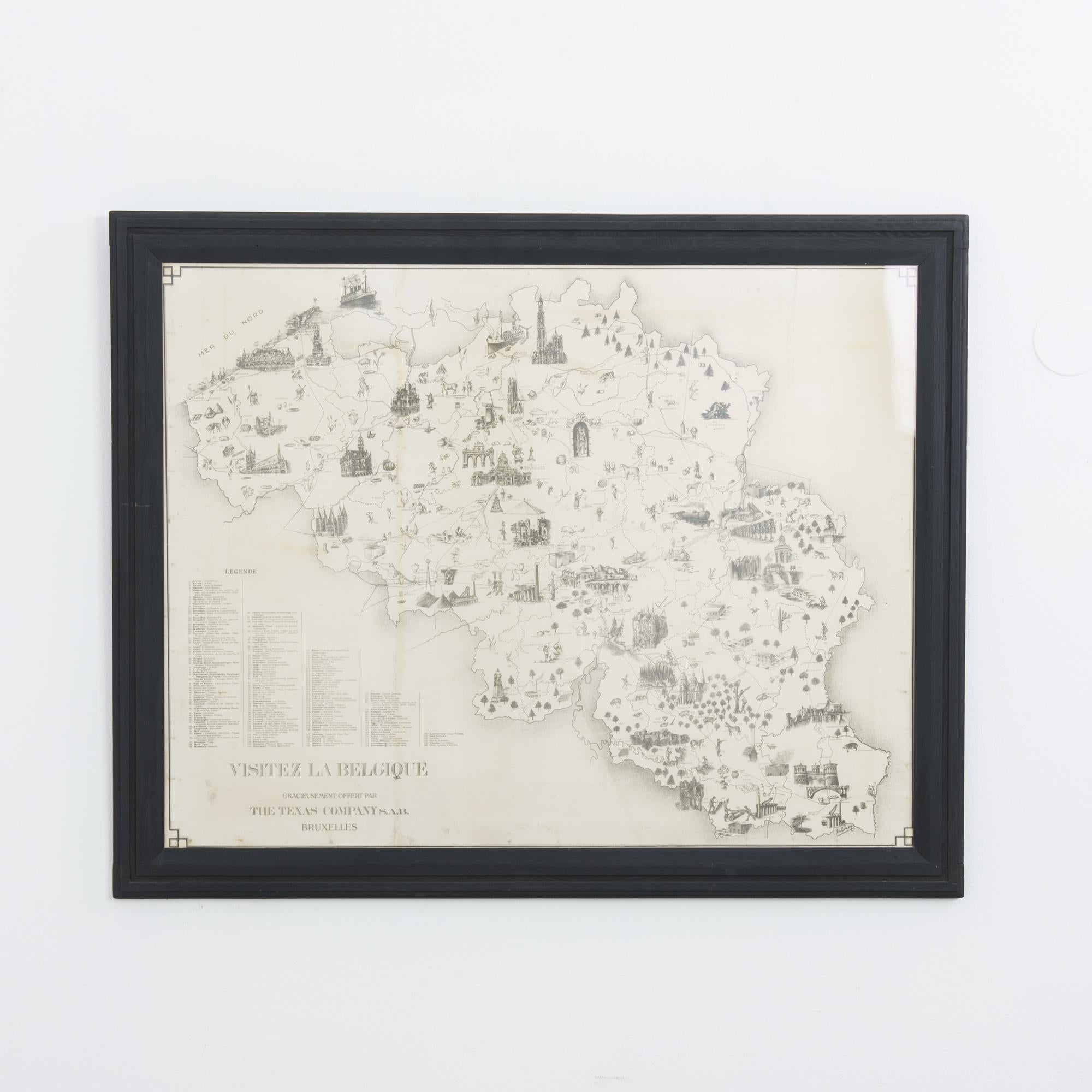 This tourist map of Belgium was made circa 1930 and is set in a matte, black frame. It was printed by the Texas Company (now known as Texaco), which expanded to Antwerp in the early twentieth century. Illustrations of tourist highlights are depicted
