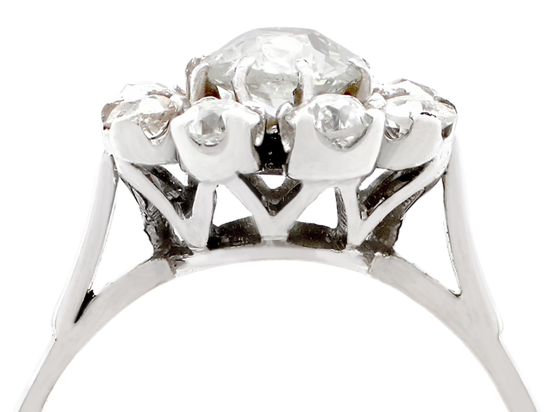 An impressive antique French 1.41 carat diamond and 18k white gold cluster ring; part of our diverse antique jewellery and estate jewelry collections.

This fine and impressive antique French diamond ring has been crafted in 18k white gold.

The