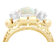 1930s, French, 1.82 Carat Cabochon Cut Opal and Diamond 18K Yellow Gold Ring
