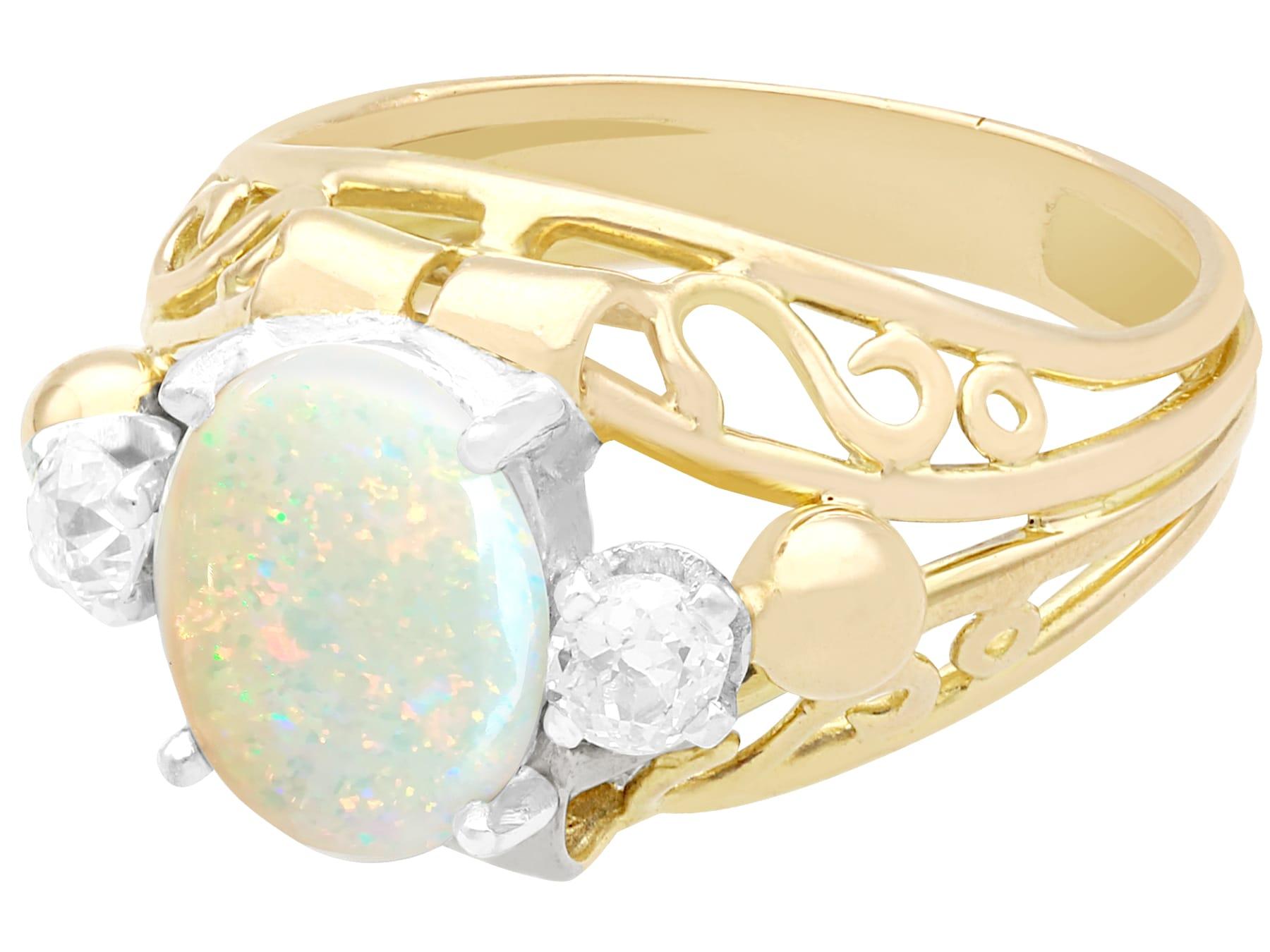 Round Cut 1930s, French, 1.82 Carat Cabochon Cut Opal and Diamond 18K Yellow Gold Ring For Sale