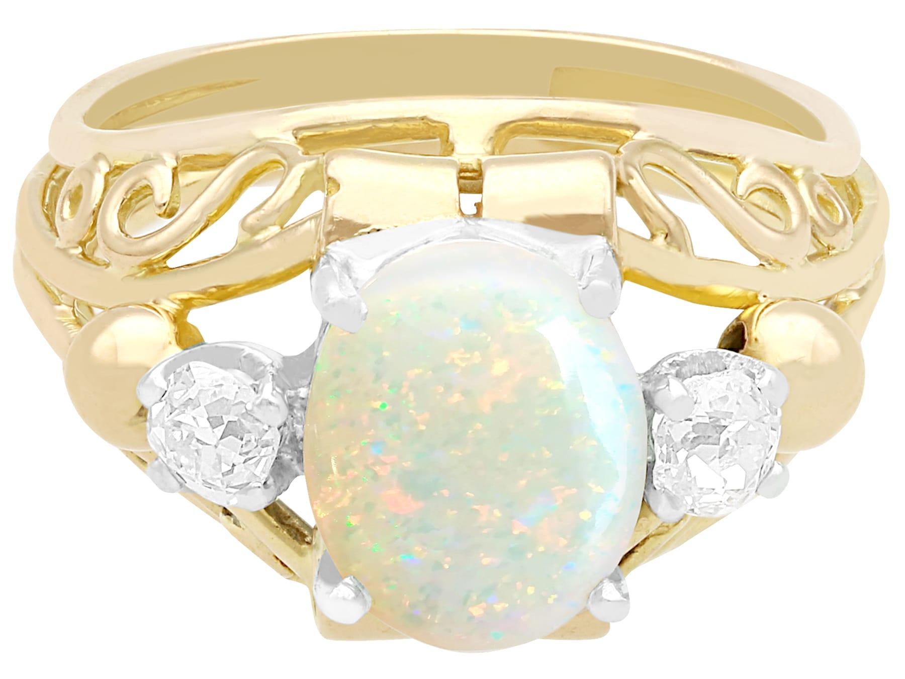1930s, French, 1.82 Carat Cabochon Cut Opal and Diamond 18K Yellow Gold Ring In Excellent Condition For Sale In Jesmond, Newcastle Upon Tyne