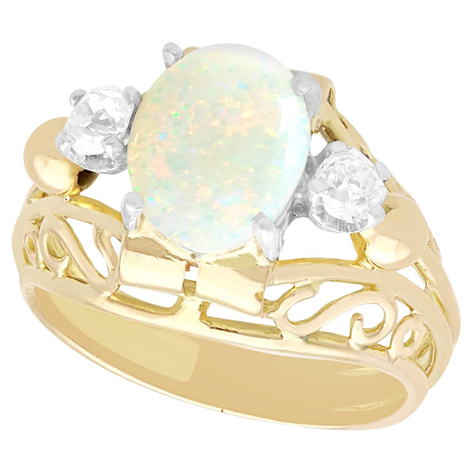 1930s, French, 1.82 Carat Cabochon Cut Opal and Diamond 18K Yellow Gold Ring