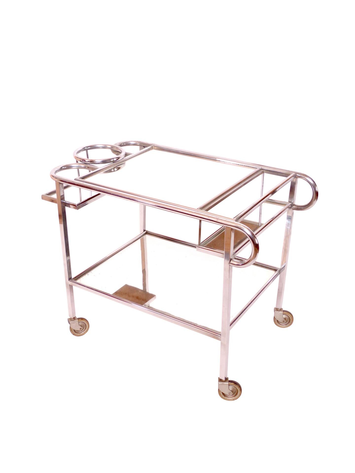 Art Deco Bar Trolley / Tea Wagon
Fresh nickeled / chromed  
Original Mirrors 
French Art Deco, 1930s 

Pictures take in a warm lighted ambience. 
Surface is chromed! 