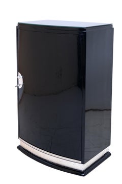 Meuble de bar Art déco français des années 1930 en laque noire avec une porte tournante