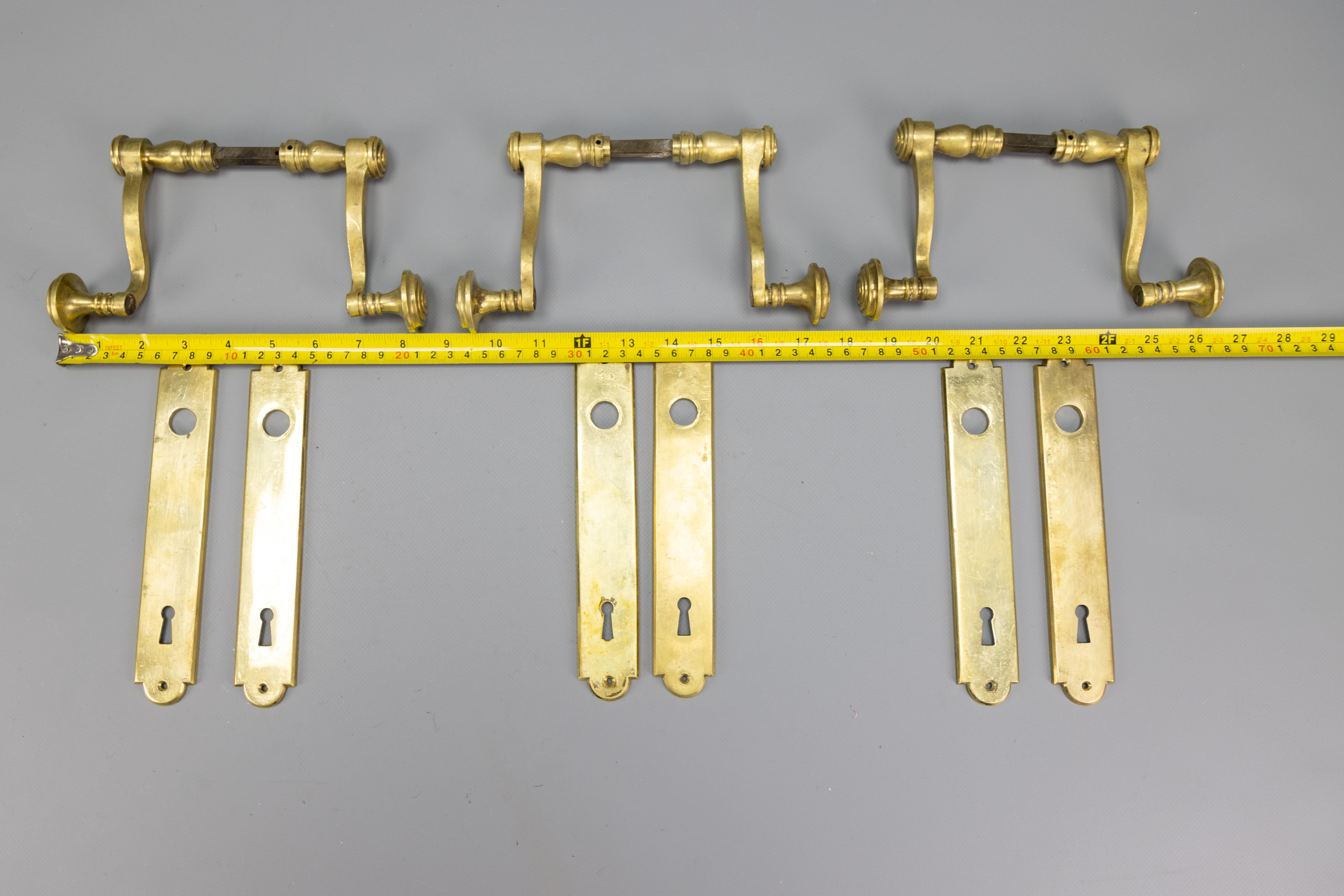 1930s French Art Deco Brass Door Handle Sets with Keyhole Backplates, Set of 3 Art Decó en venta