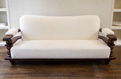 1930s French Art Deco Carved Oak Sofa in the style of Charles Dudouyt