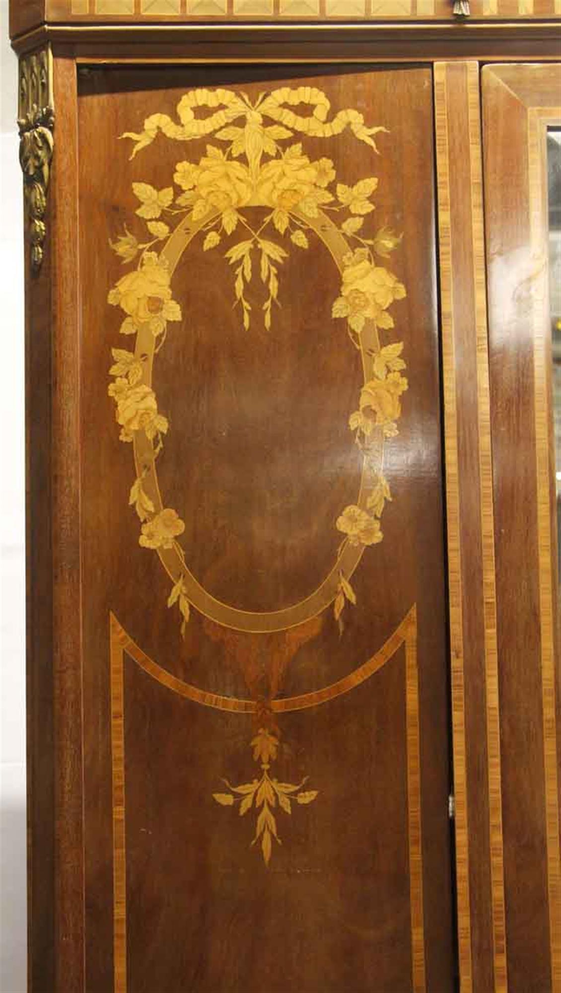 1930s French Art Deco Carved Walnut Mirrored Armoire with Detailed Inlays In Good Condition In New York, NY