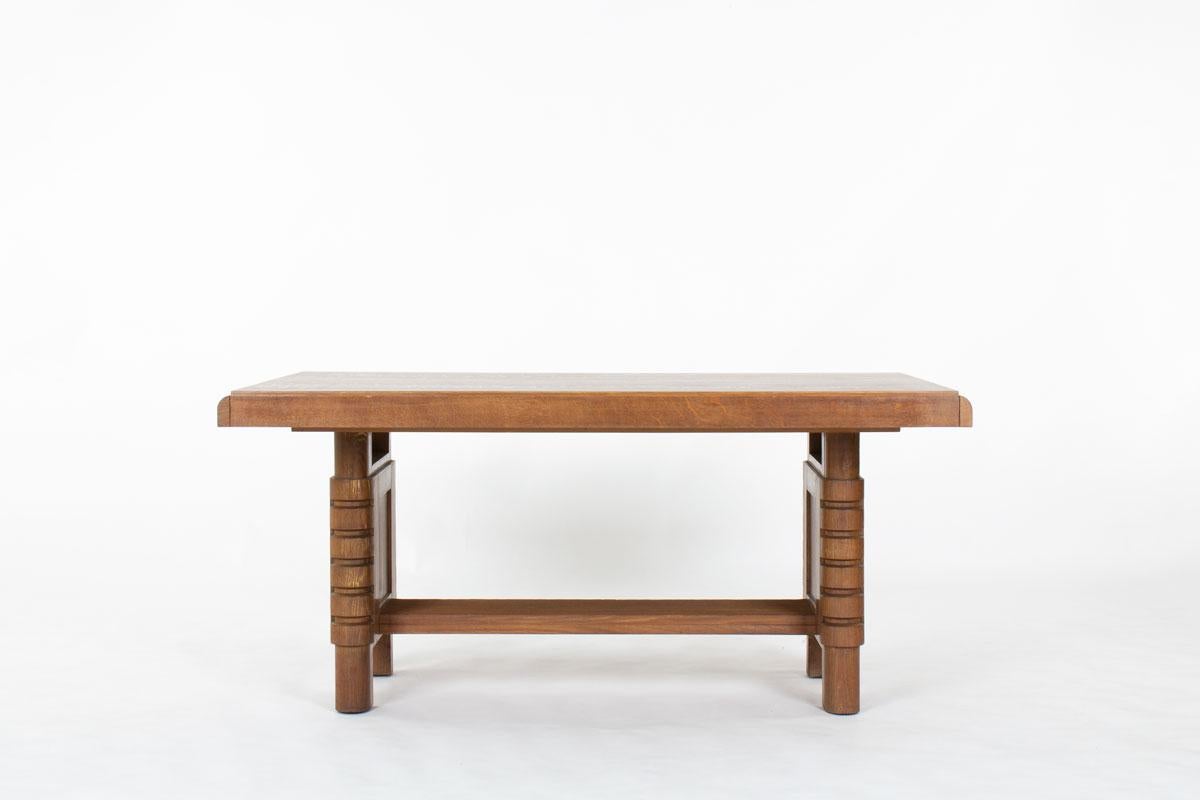 Channeling the bold elegance of 1930s French design, this rectangular oak dining table captures the essence of the Art Deco movement, with a sculptural presence and architectural balance reminiscent of Charles Dudouyt’s iconic style.

Crafted from