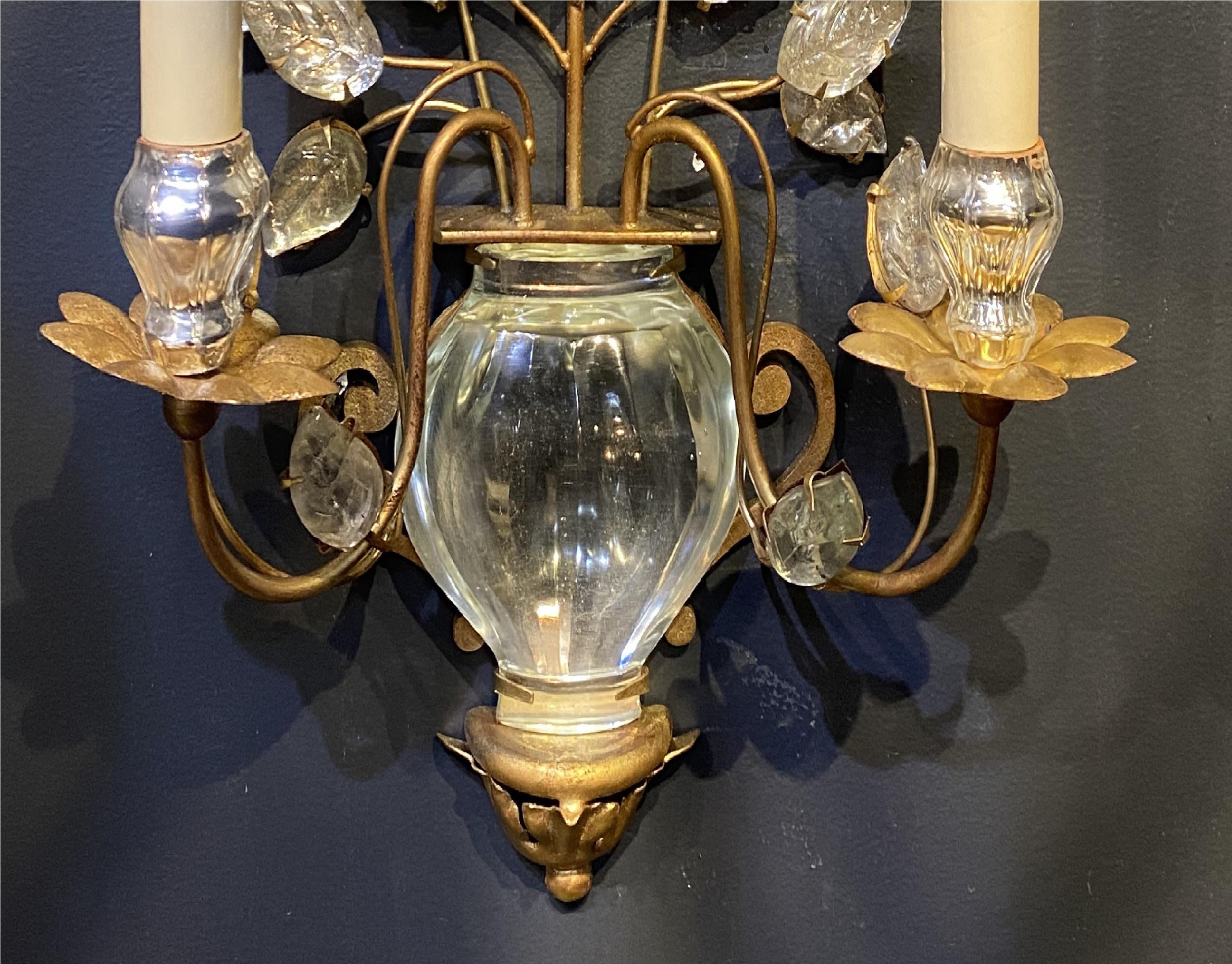 A pair of circa 1930’s French Bagues double light sconces with mirrored cut crystal body