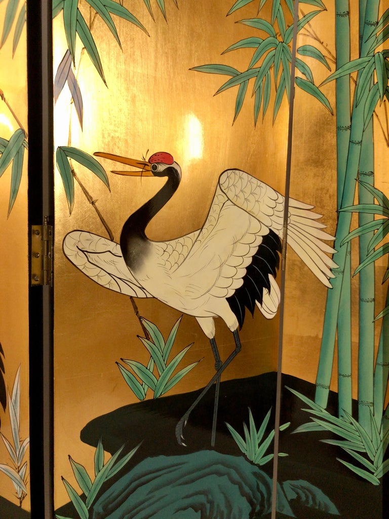 Original French Art Deco Paravent, circa 1930 
Wooden room screen / divider 
Black and golden 
Water bird / Herons motive 

Dimensions: 
wide 160 cm 
high 183 cm.
