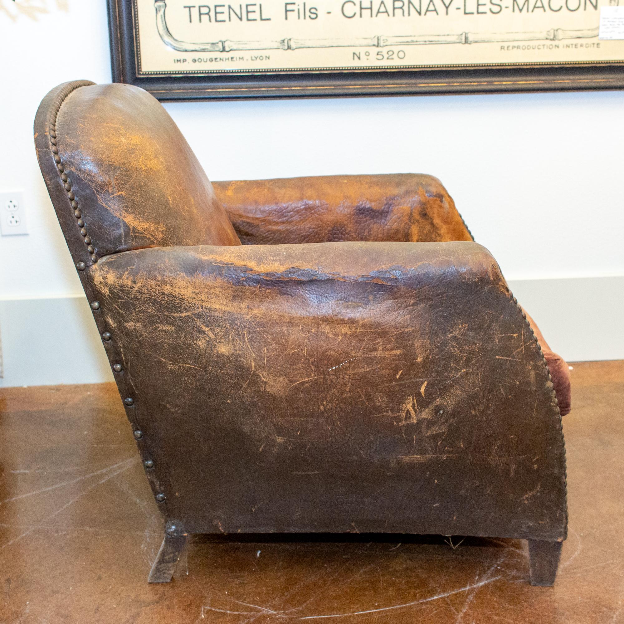 1930s French Distressed Leather and Velvet Armchair with Brass Nailhead Detail In Distressed Condition In Houston, TX