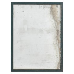 1930s French distressed vintage mirror in green painted hammered wrought iron