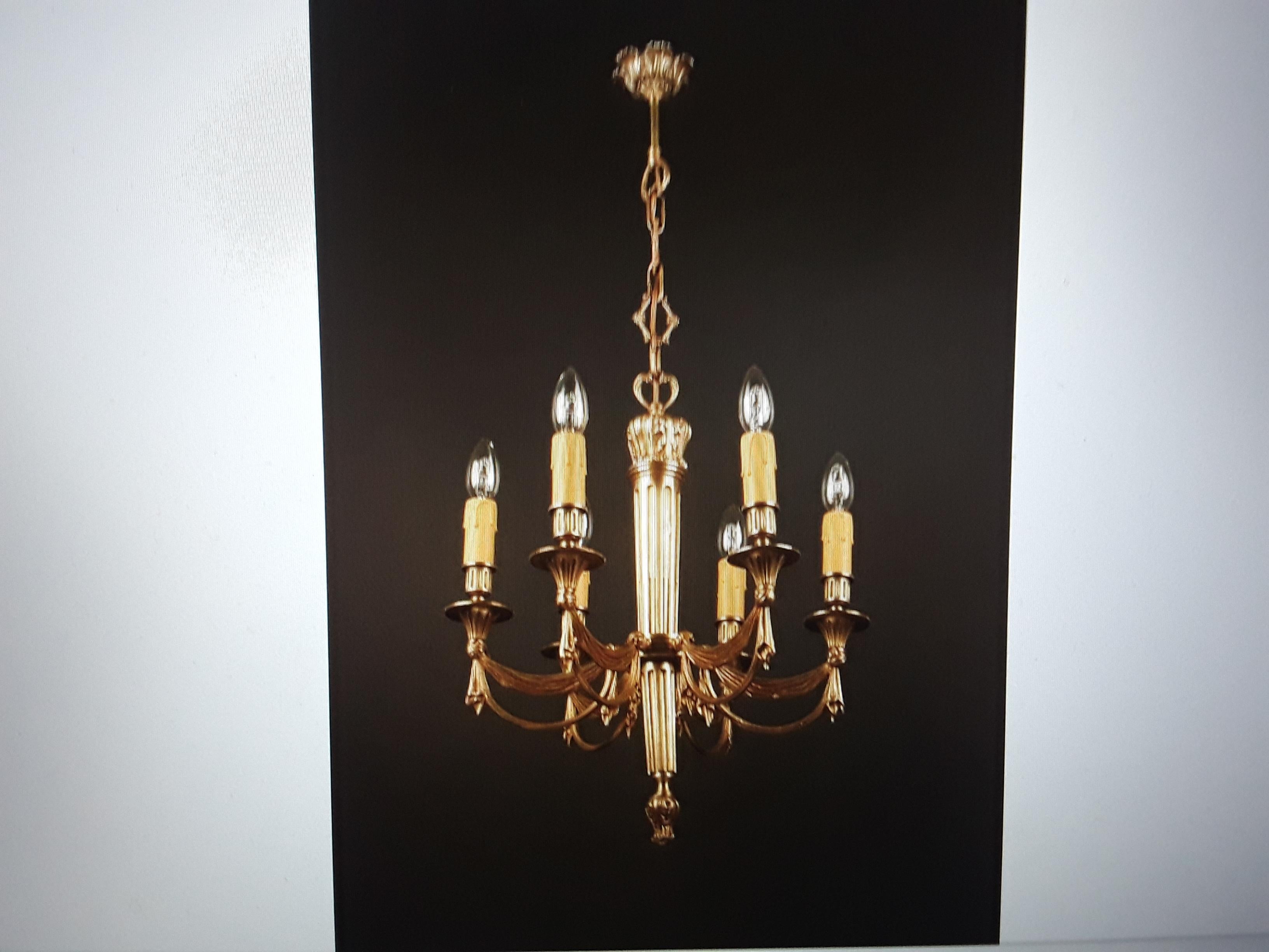 Spectacular 1930's French Empire Dore Bronze Chandelier. Bronze drapery swag detail. With Neoclassical elements. Attributed to Maison Bagues.