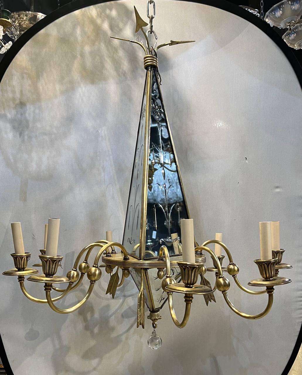 A circa 1930's French Empire style bronze chandelier with etched mirrored triangle body.