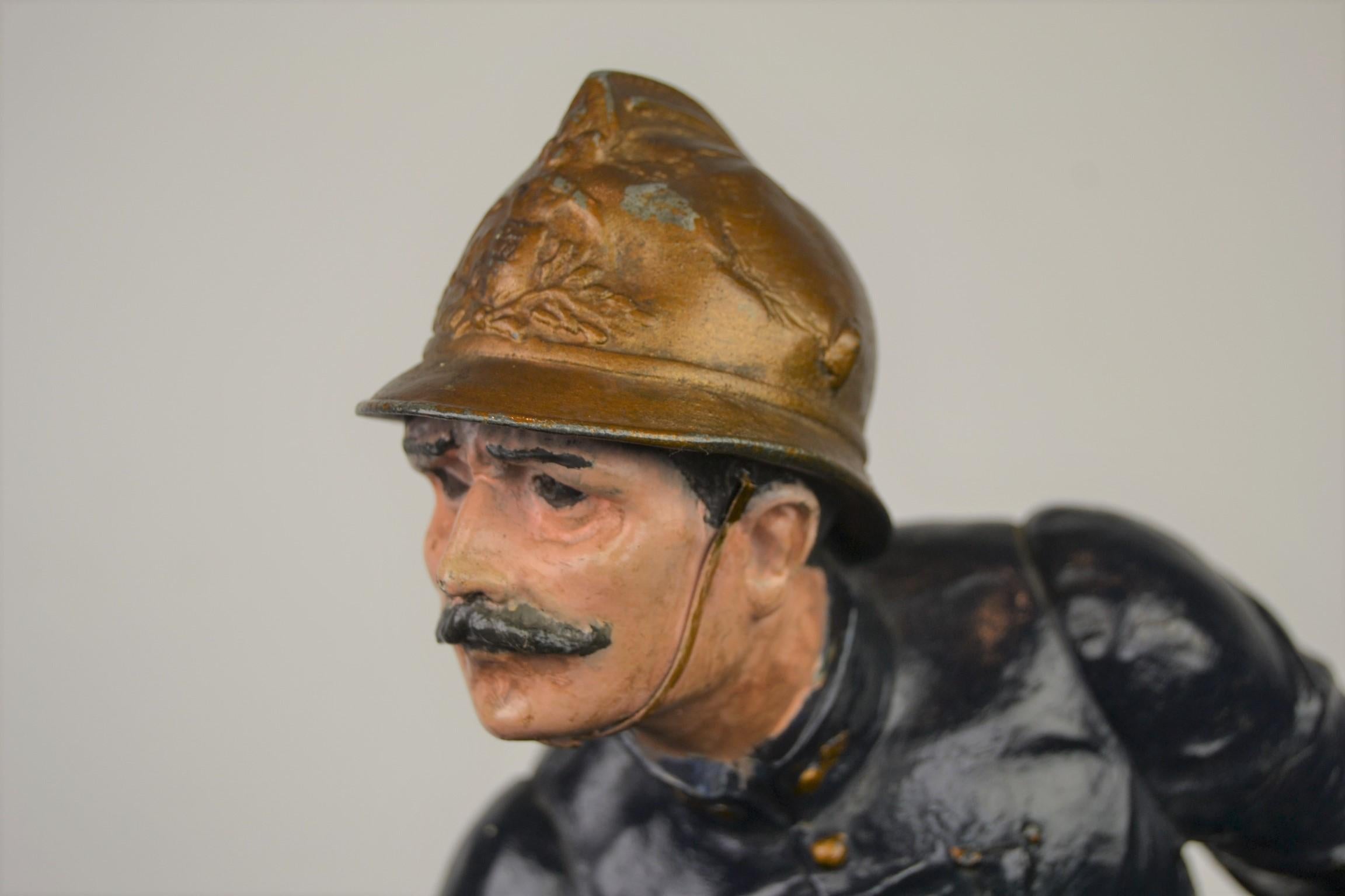 1930s French Fireman or firefighter sculpture or trophy statue. 
A great large statue or sculpture of a French firefighter in action, standing in the flames with his fire hose to extinguish the fire. 
This French sculpture dates between 1900 -