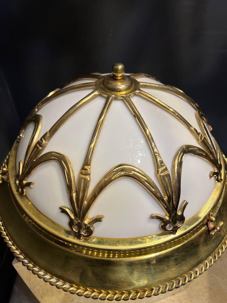 A circa 1930 French gilt bronze light fixture with 2 interior lights, and Opaline glass inset from a Paris Hotel (available also in silver finish)
