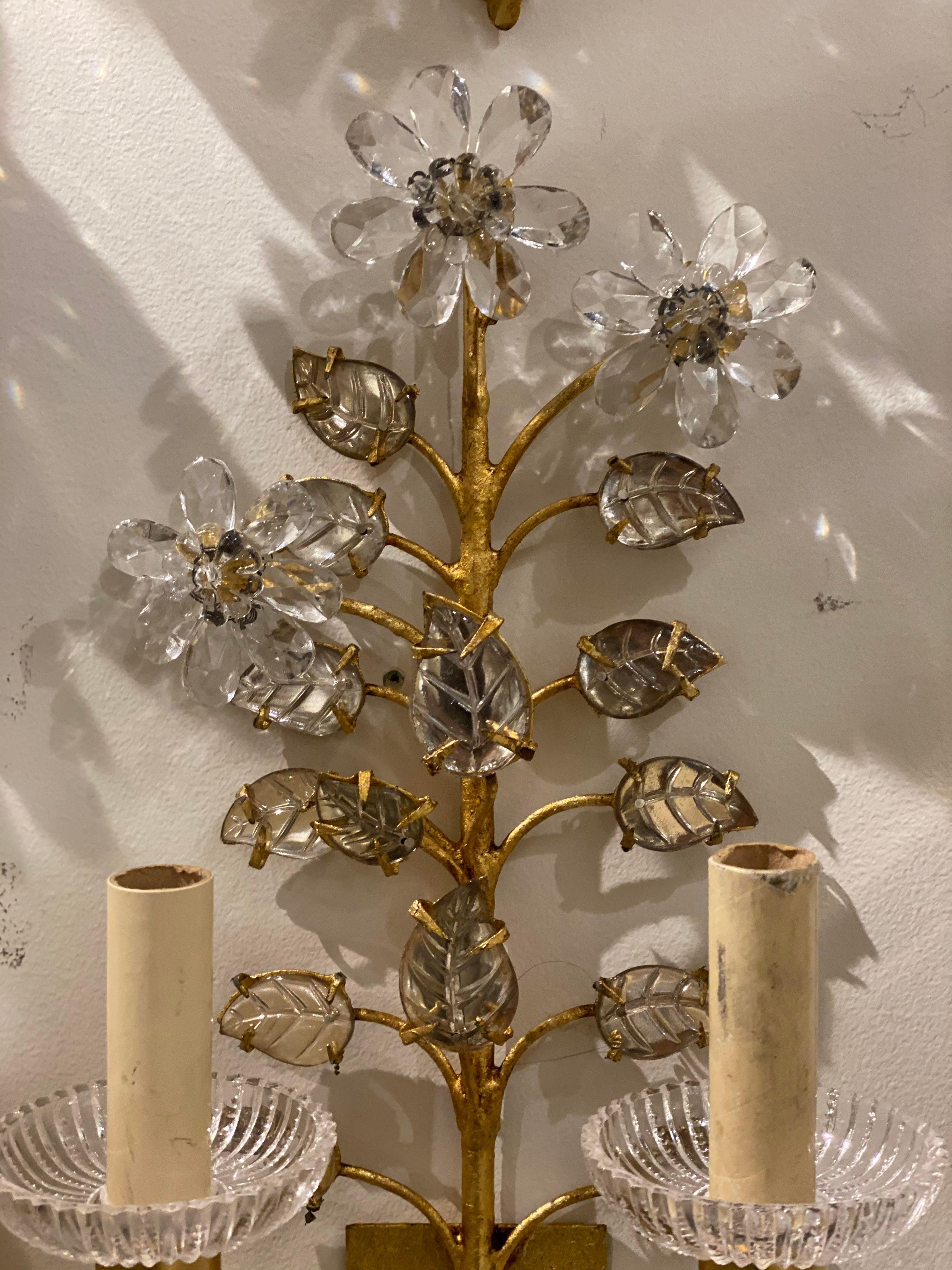 A pair of circa 1930’s gilt metal double light sconces with floral design by Bagues from Iranian princess state in NYC 
