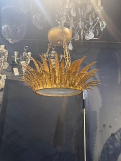 1930 Francese in metallo dorato con montatura a incasso a raggiera