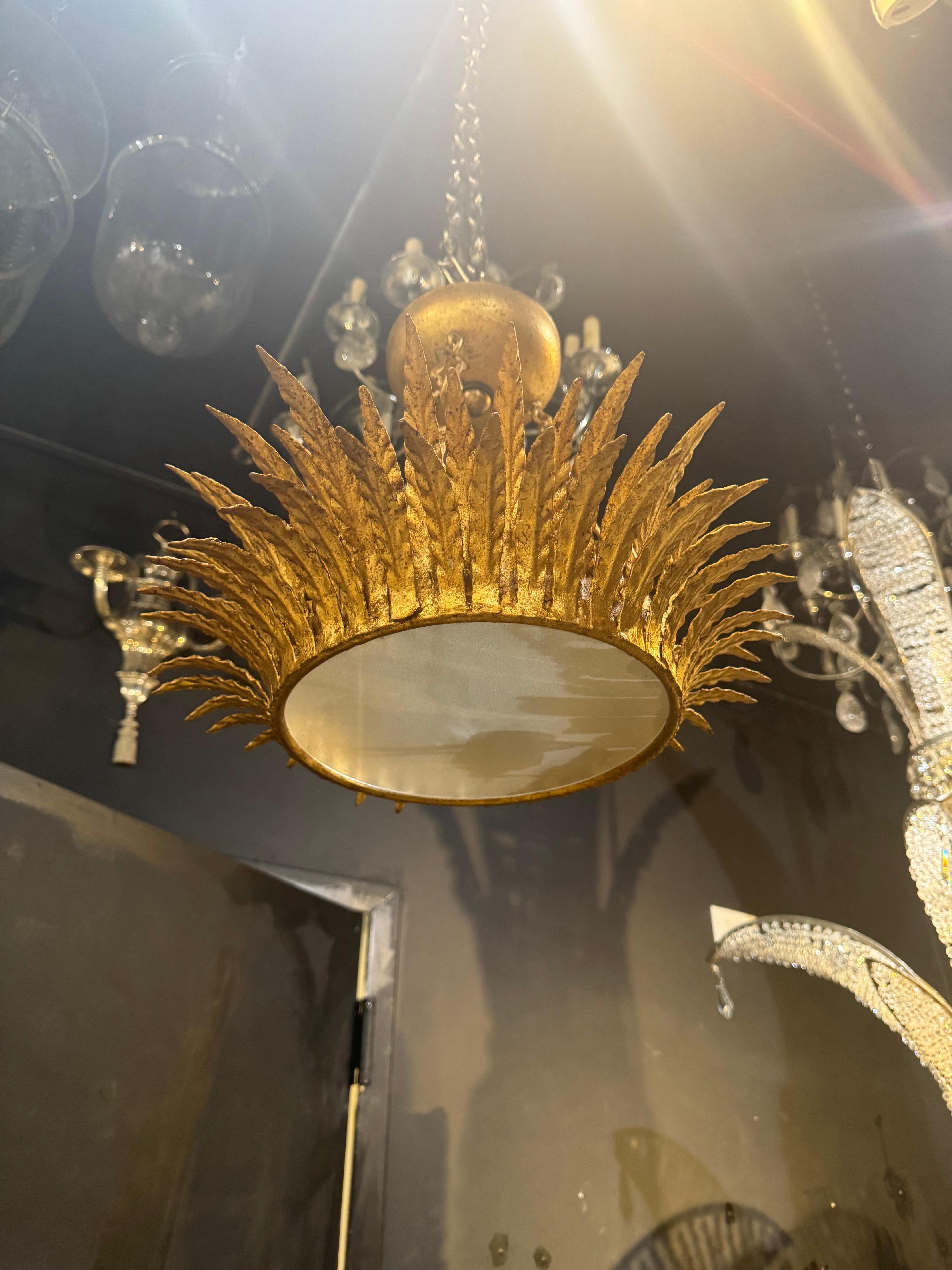 Gilt 1930’s French gilt metal sunburst For Sale