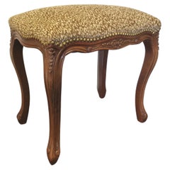 1930's French Hand Carved Walnut Ottoman with Leopard Print Upholstery