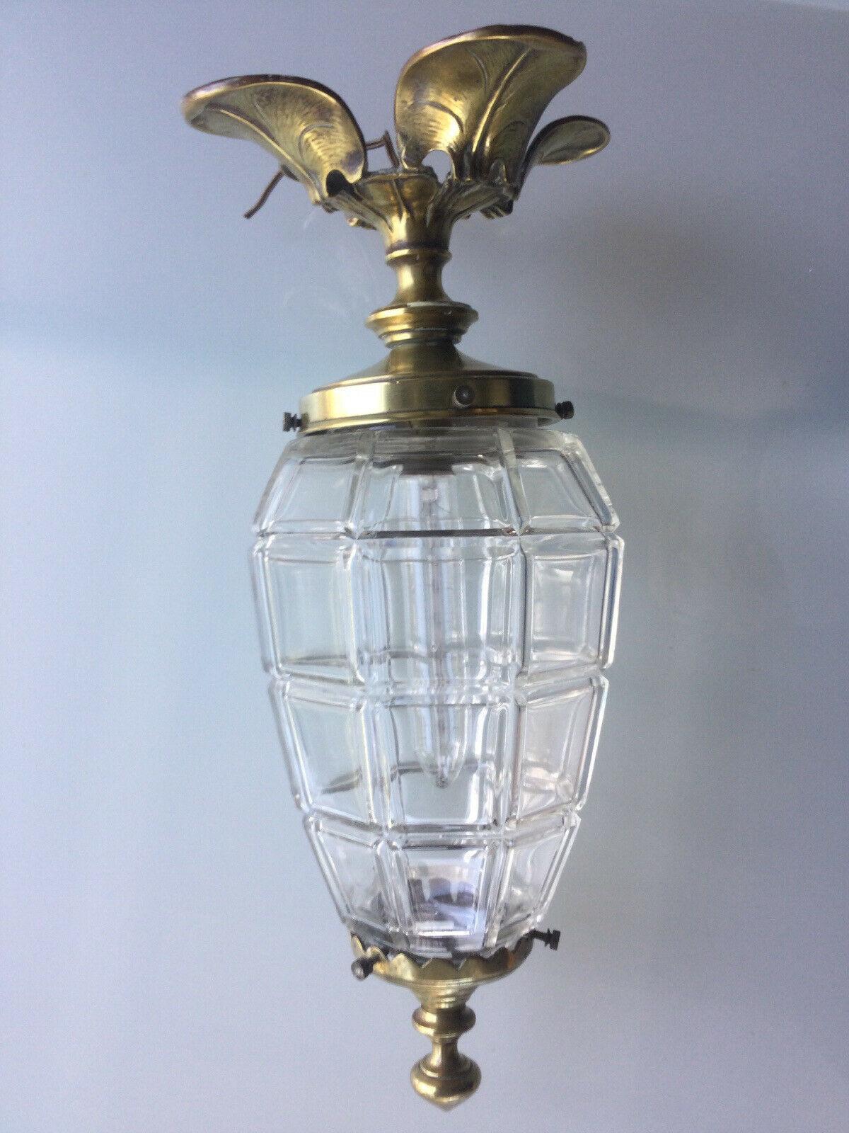 1930's French Louis XV Versailles style Nenuphar Bronze with Crystal Ceiling Lantern fixture. The style inspired by Baccarat.