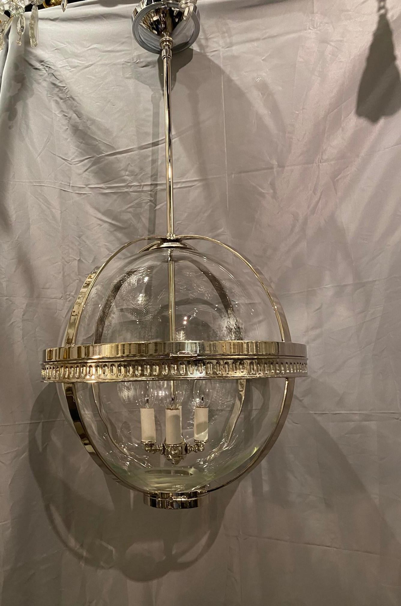 A circa 1930’s French nickel plated light fixture with blown glass inset 