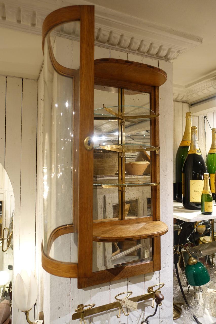 Stunning wall display cabinet, from 1930s France. Beautiful carpentry, and made of oak. Provenance, hug at a barbers shop, and used to display the boutique’s products for the gentlemen clients.

A unique and lovely cabinet, with its original
