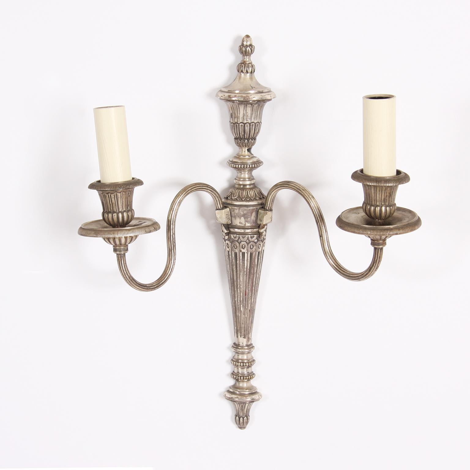 French 1930s

A stunning pair of silver plated wall sconces. 

Rewired and PAT tested.