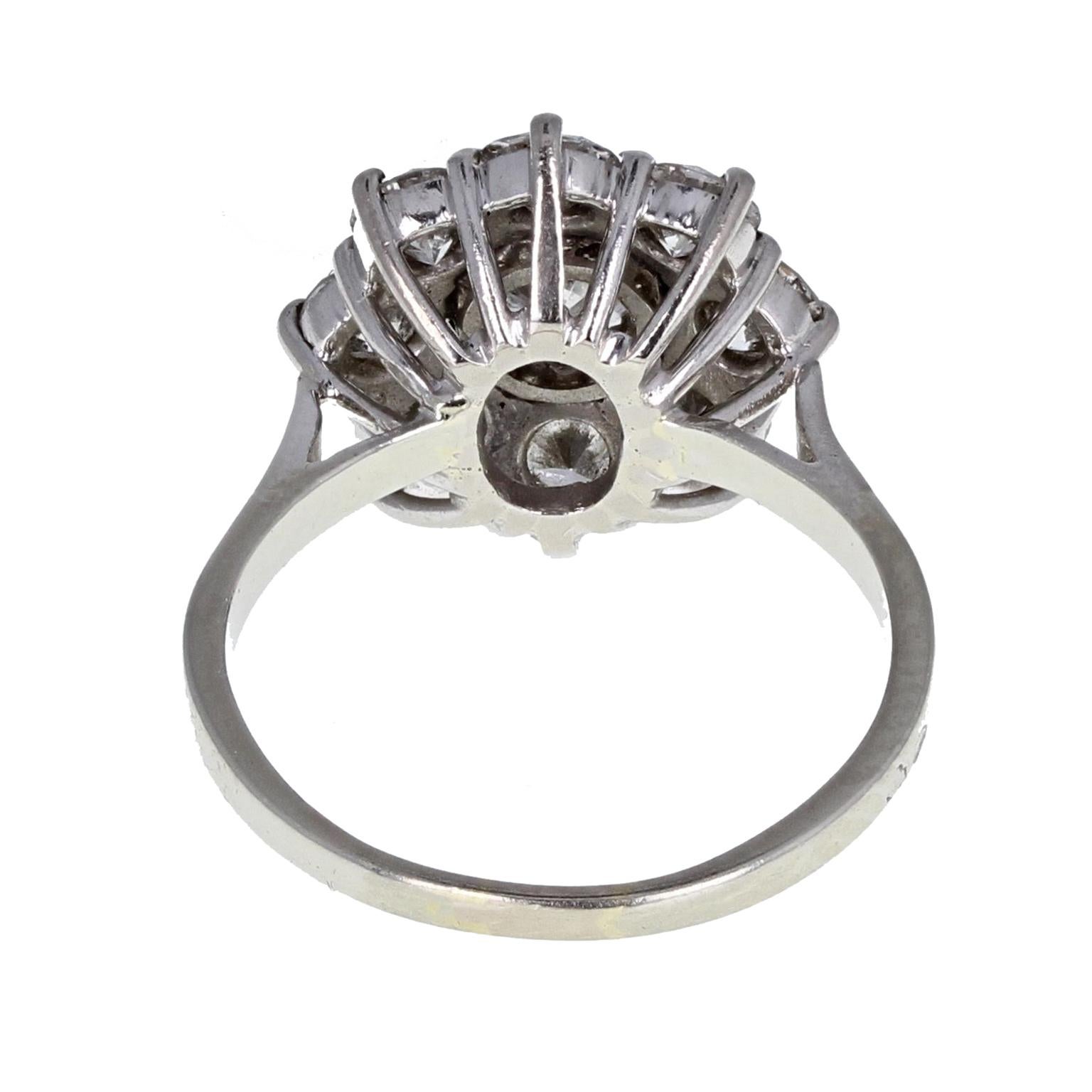 Round Cut 1930s French Platinum Diamond Daisy Cluster Ring For Sale