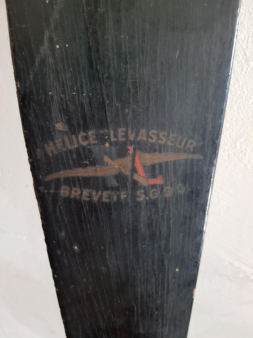 Original blackened wooden propeller of the French firm Hélice Levasseur serial number 985 36323 and PL monogram from circa 1930.

The measurements are:
Depth 7 cm/ 2.7 inch.
Width 16 cm/ 6.2 inch.
Height 120 cm/ 47.2 inch.
 