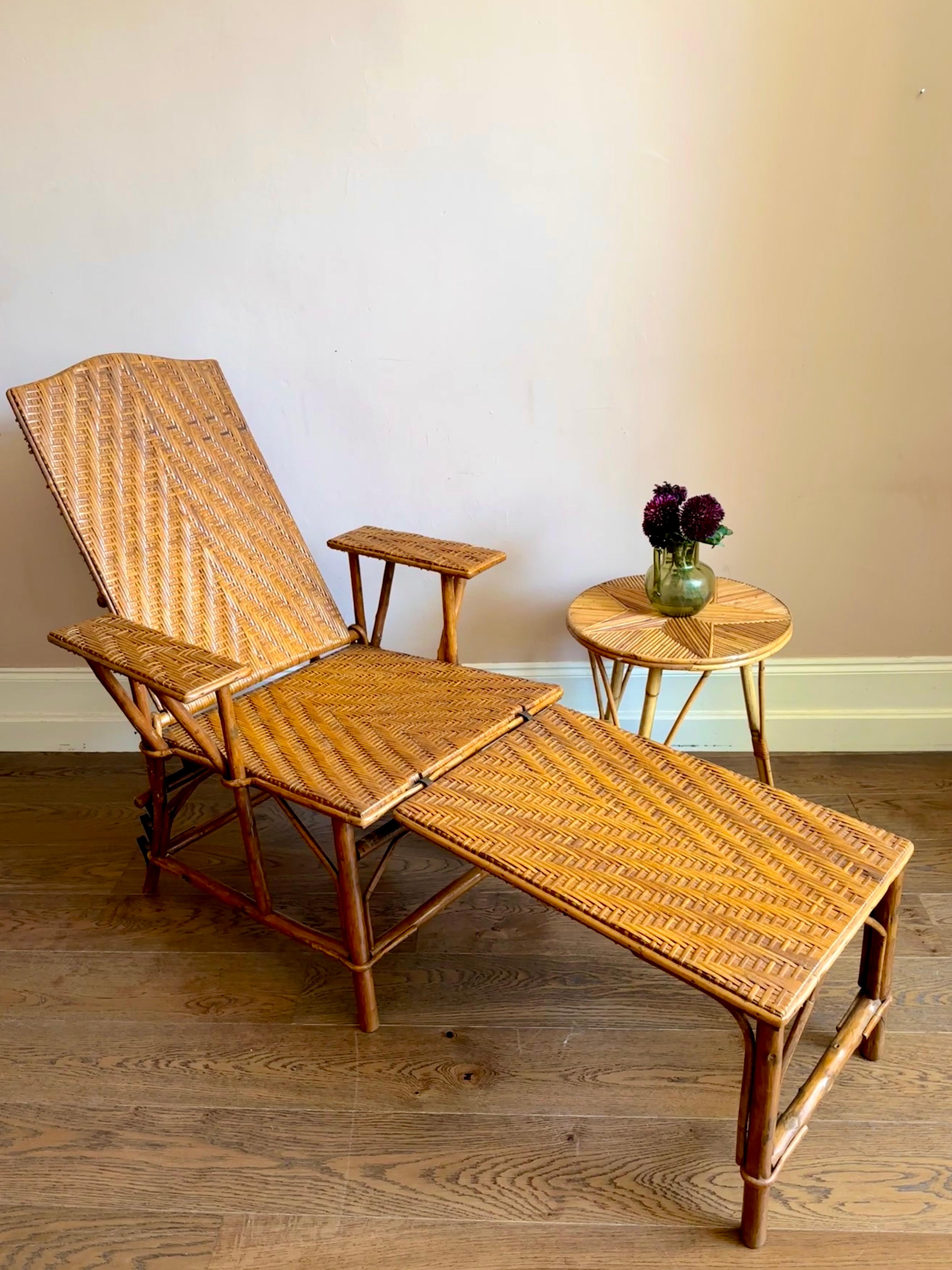 1930s French rattan & wood chaise longue.

Gorgeous sun lounger in woven herringbone pattern with adjustable back and removable ottoman section. In excellent and sturdy condition with very light wear.

Reclined Length 174cm Upright Length 142cm Seat