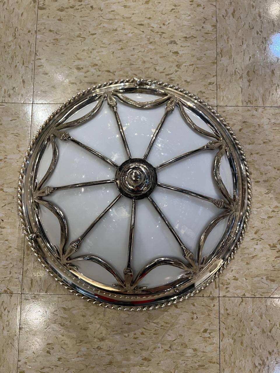 A circa 1930s French silver plated basis small light fixture with ribbon design and Opaline glass inside.

Dealer: G302YP