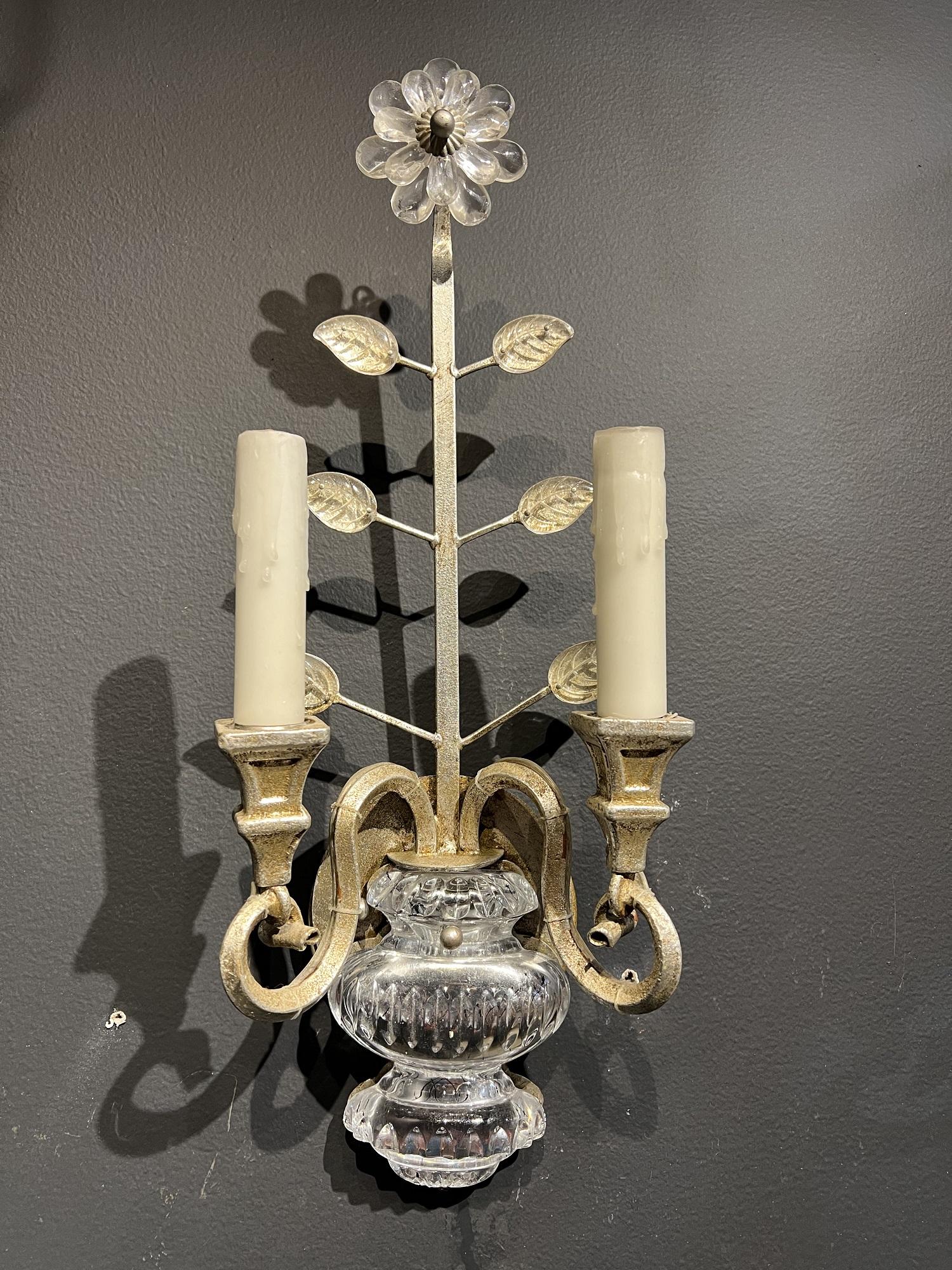 A pair of circa 1930’s French silvered simple small sconces with crystal body and flower with two lights 