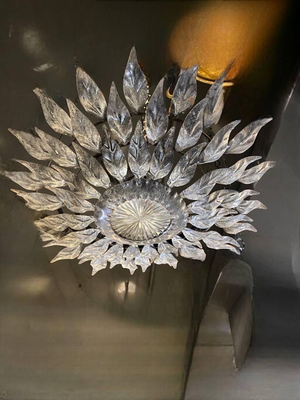 circa 1930’s French silvered sunburst flush mount with two lairs of leaves