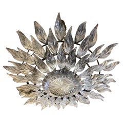 Monture de chasse d'eau en bronze argenté des années 1930