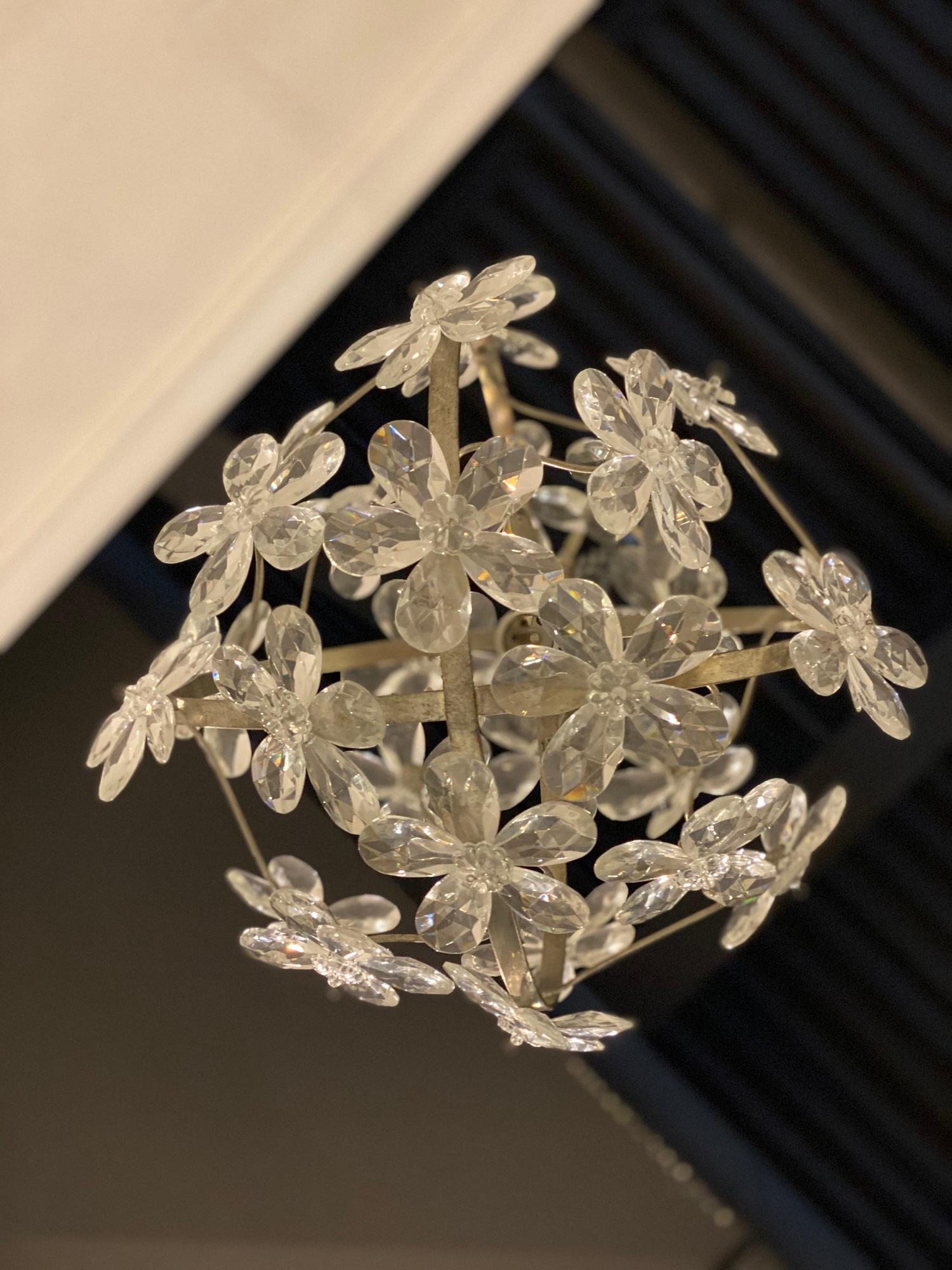 A circa 1930's French crystal flowers light fixture with interior lights