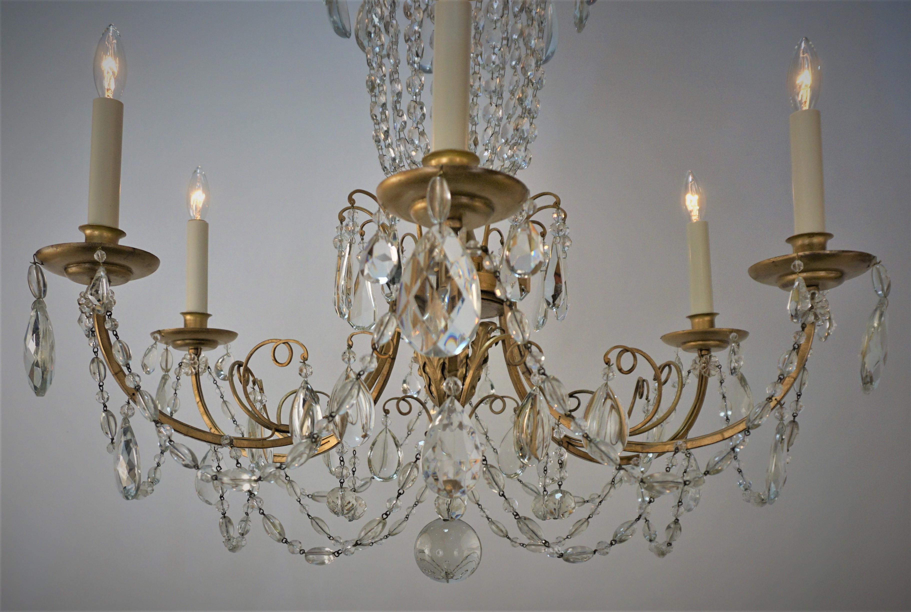 1930's Gilt Iron Crystal Chandelier For Sale 1