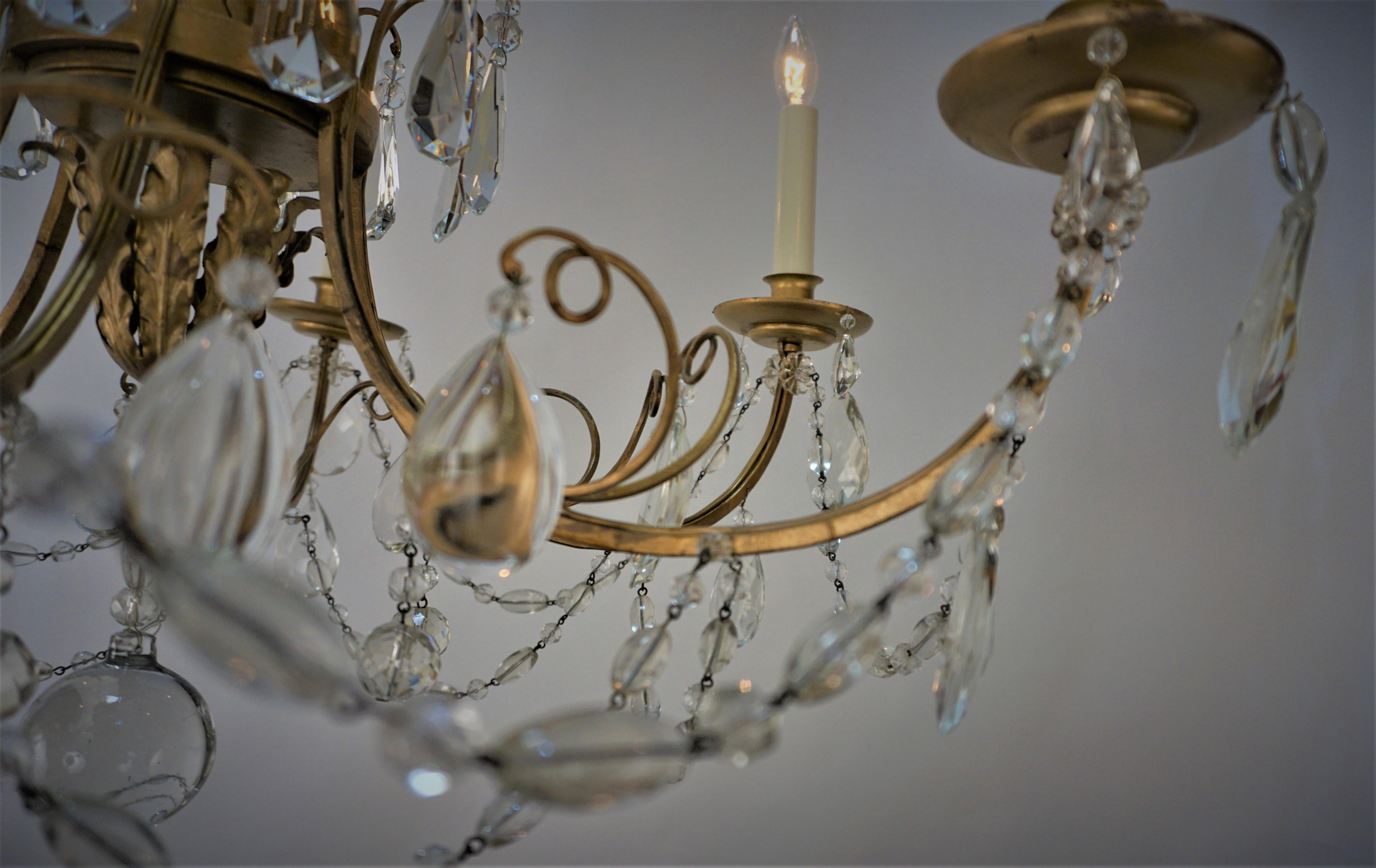 1930's Gilt Iron Crystal Chandelier For Sale 4