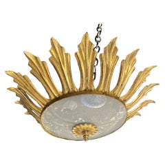 Apparecchio di illuminazione a raggiera in metallo dorato del 1930